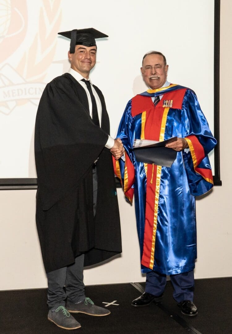 Hugh Bartholomeusz and a graduate